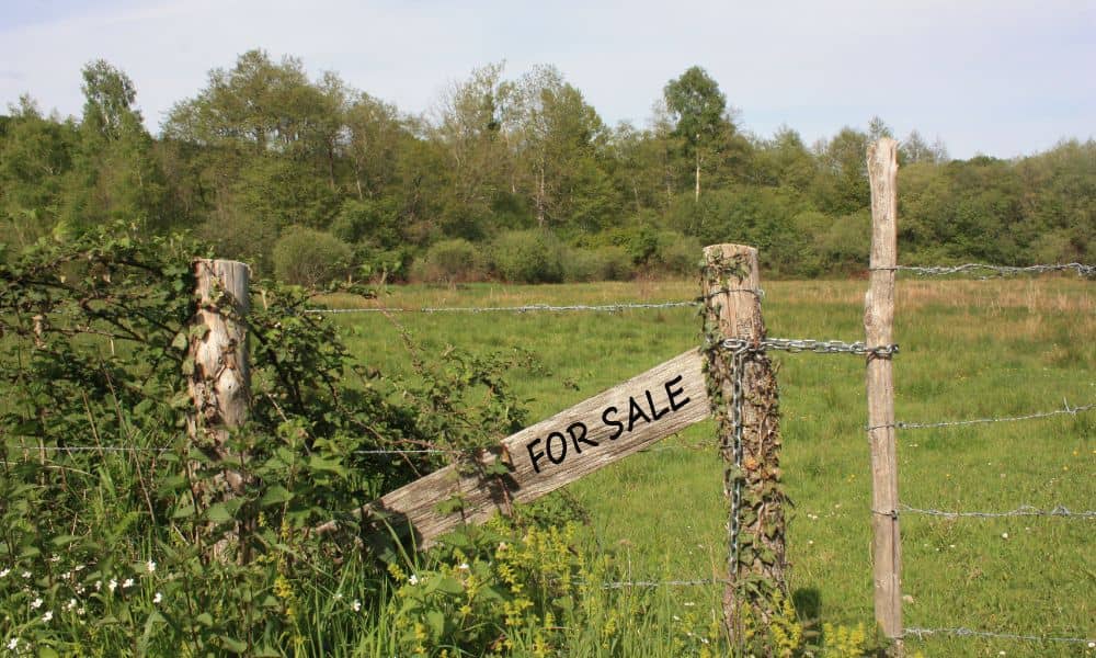 Due diligence survey rural property colorado - ALTA SURVEY Denver Rural property for sale with wooden fence and sign, showing the need for a due diligence survey in Colorado