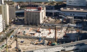 Urban construction site showing how a land development engineer plans infrastructure and site layout